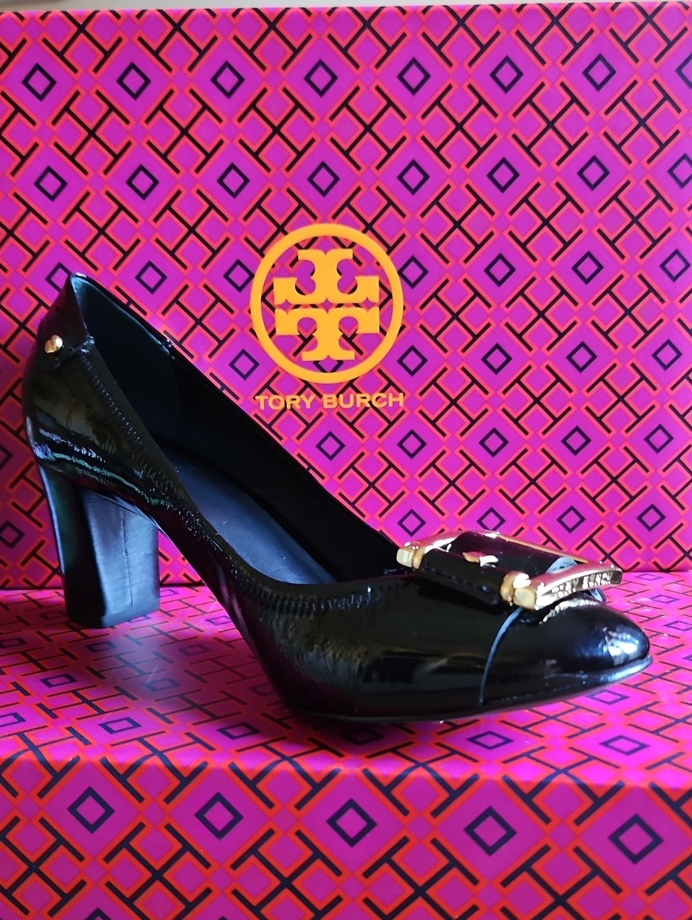 Like NEW. Tory Burch Black Patent Leather Block Heel Pumps with Gold Logo.